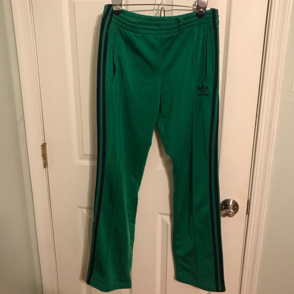Green adidas track pants
